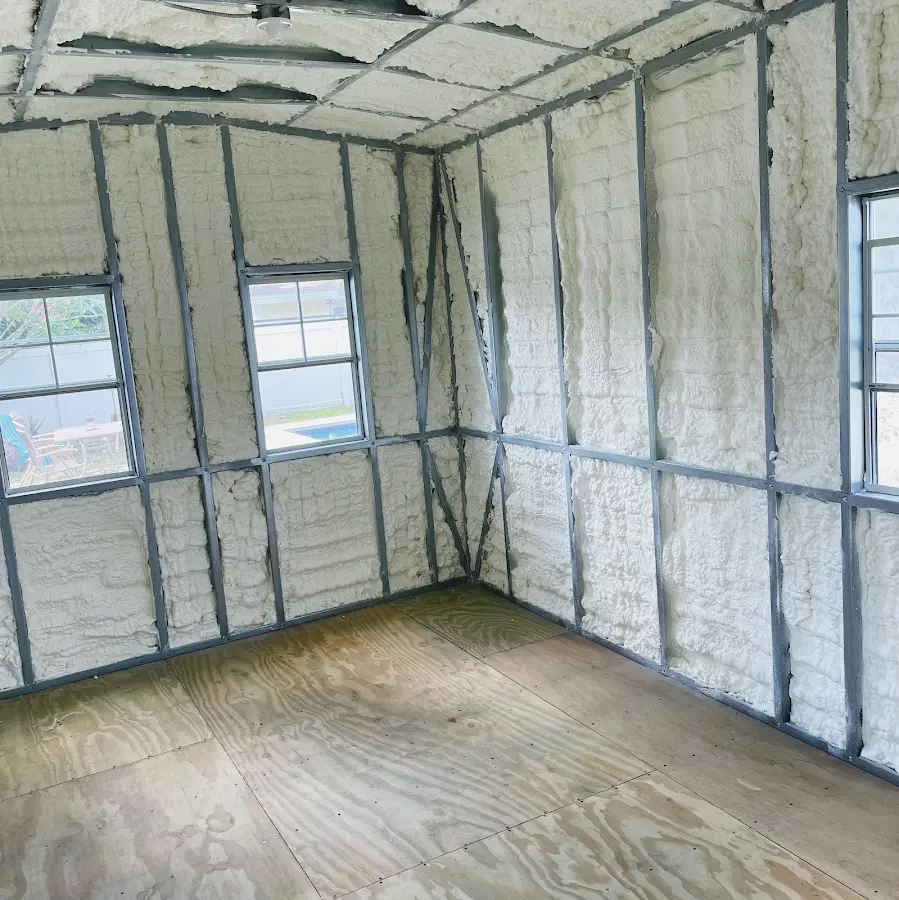 Closed-cell spray foam insulation applied to wall cavities in a residential project in St. Clair Shores